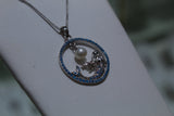Sterling Silver Mermaid Within Blue Topaz & Hanging White Pearl