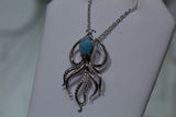 Blue Larimar Octopus Swimming With White Zircon