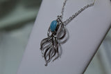 Blue Larimar Octopus Swimming With White Zircon