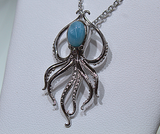 Blue Larimar Octopus Swimming With White Zircon