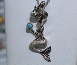 Sterling Silver Mermaid Holding Blue Laiarm stone Necklace