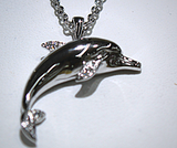Sterling Silver Dolphin with White Zircon Accents