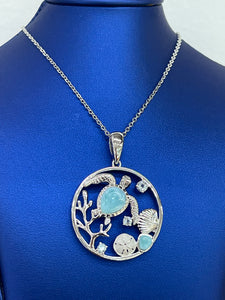 Enchanting Ocean Wonders Necklace - Sea Turtle with Larimar Gems, Sea Shell, and Sand Dollar Accents