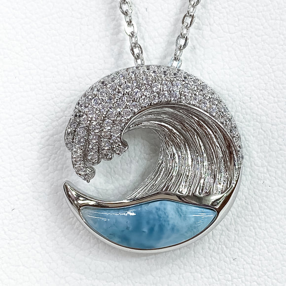Sterling silver wave pendant with cubic zorconia setting
