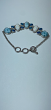 Adorable Silver Bracelet With Blue Larimar, White Opals, & Blue Topaz.