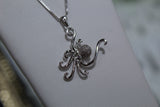 Sterling Silver Octopus Pendant With White Topaz