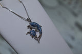 Sterling Silver Dolphin & Turtle Pendant With Blue Topaz