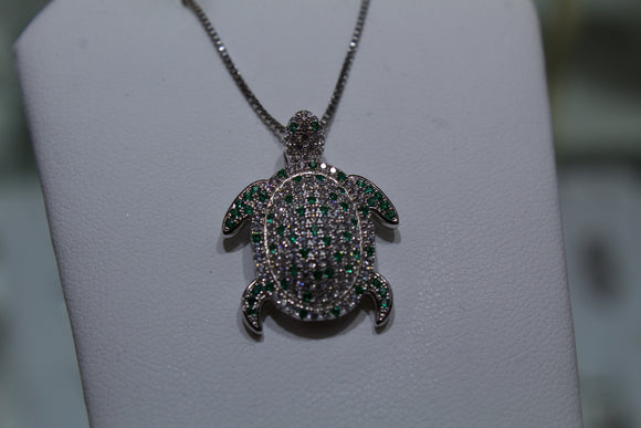 White and Green Zircon gem covered turtle pendant necklace