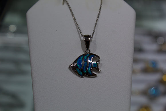 Small necklace pendant in shape of anglefish with blue and green opals for color