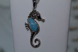 Oceanic Elegance: Sterling Silver Seahorse Pendant with Captivating Blue Larimar