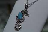 Oceanic Elegance: Sterling Silver Seahorse Pendant with Captivating Blue Larimar